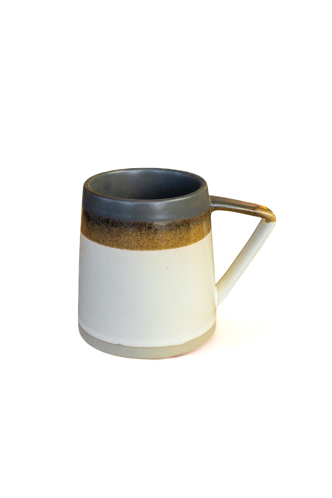 Ceramic mug with white body and dark brown speckled rim, side handle