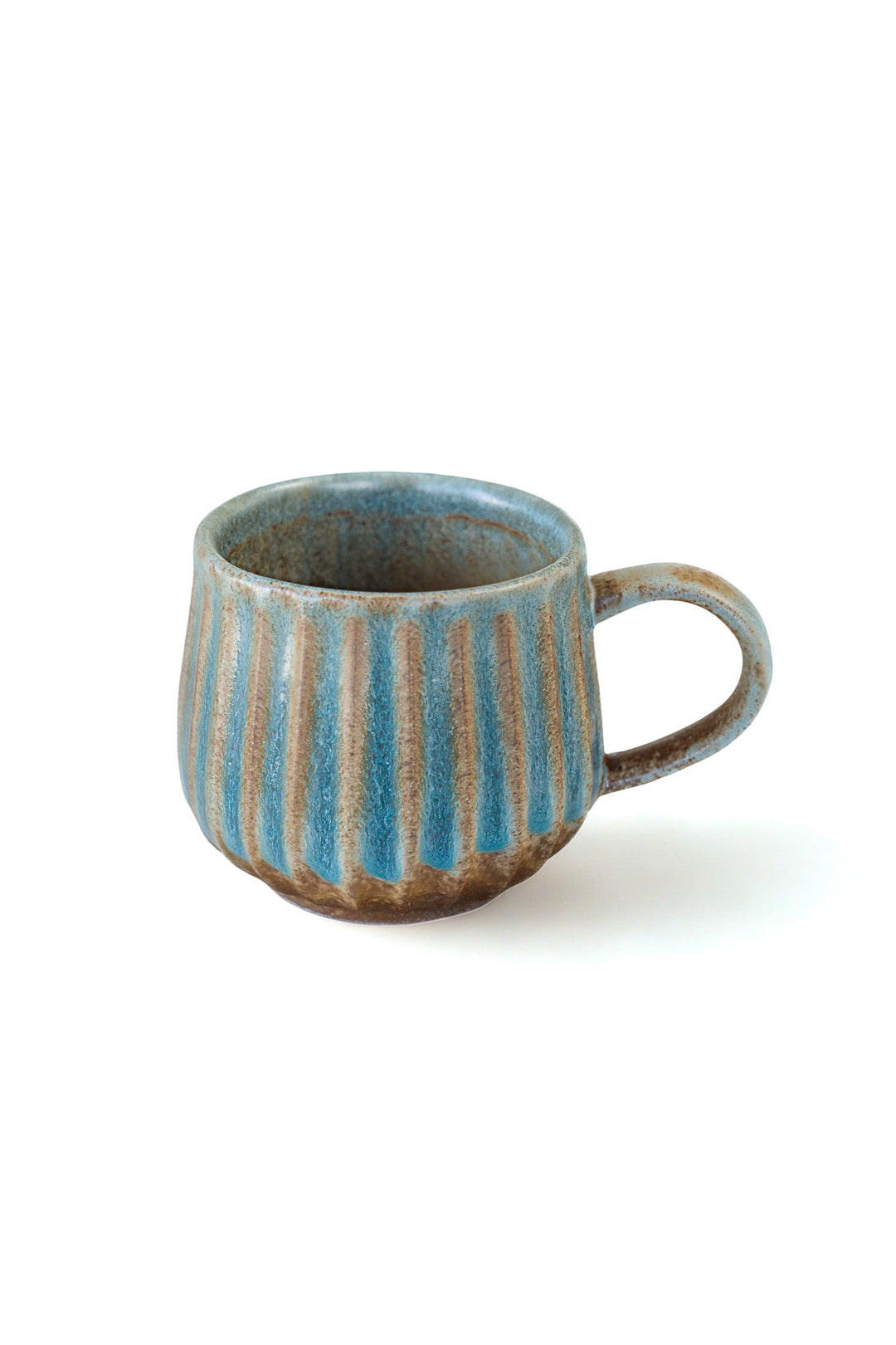 Handmade turquoise ceramic mug with vertical stripes, curved handle, round rim