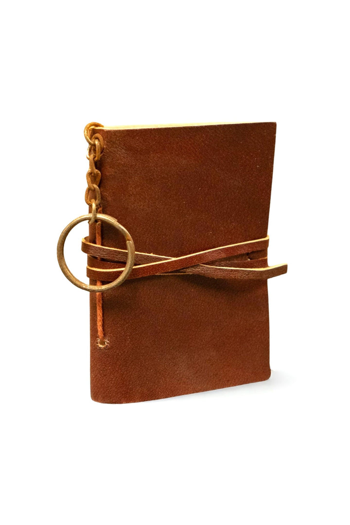 Distressed leather mini journal with keychain ring, dark red-brown cover