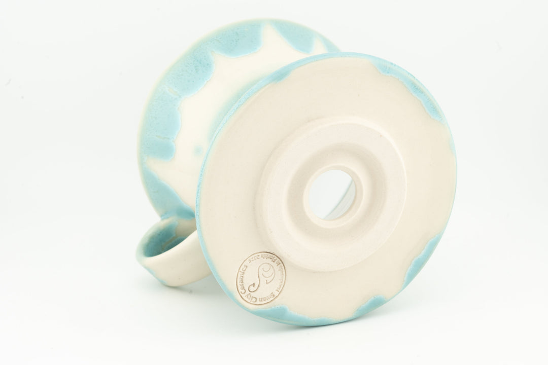 Ceramic coffee pour-over dripper base, light aqua glaze with pale blue drip pattern