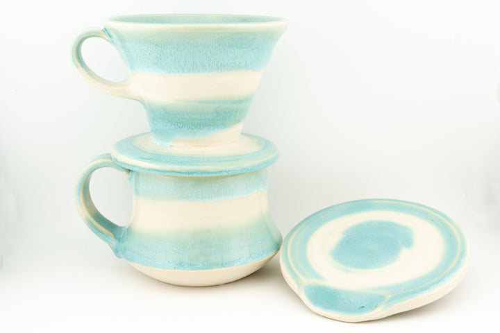 Ceramic coffee mug set with coaster, two tall curvy mugs in light turquoise glaze