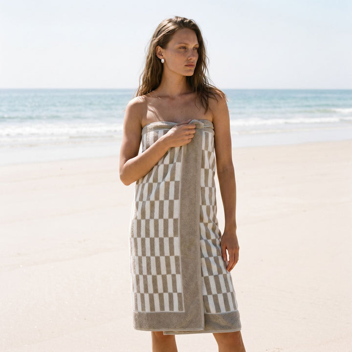 Cotton checkered beach towel in gray-and-white grid pattern