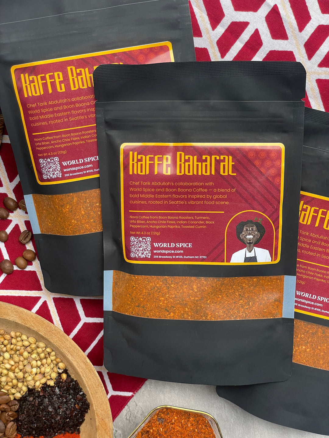 Coffee spice blend pouch with label, dark bag and orange-brown spice stripe.