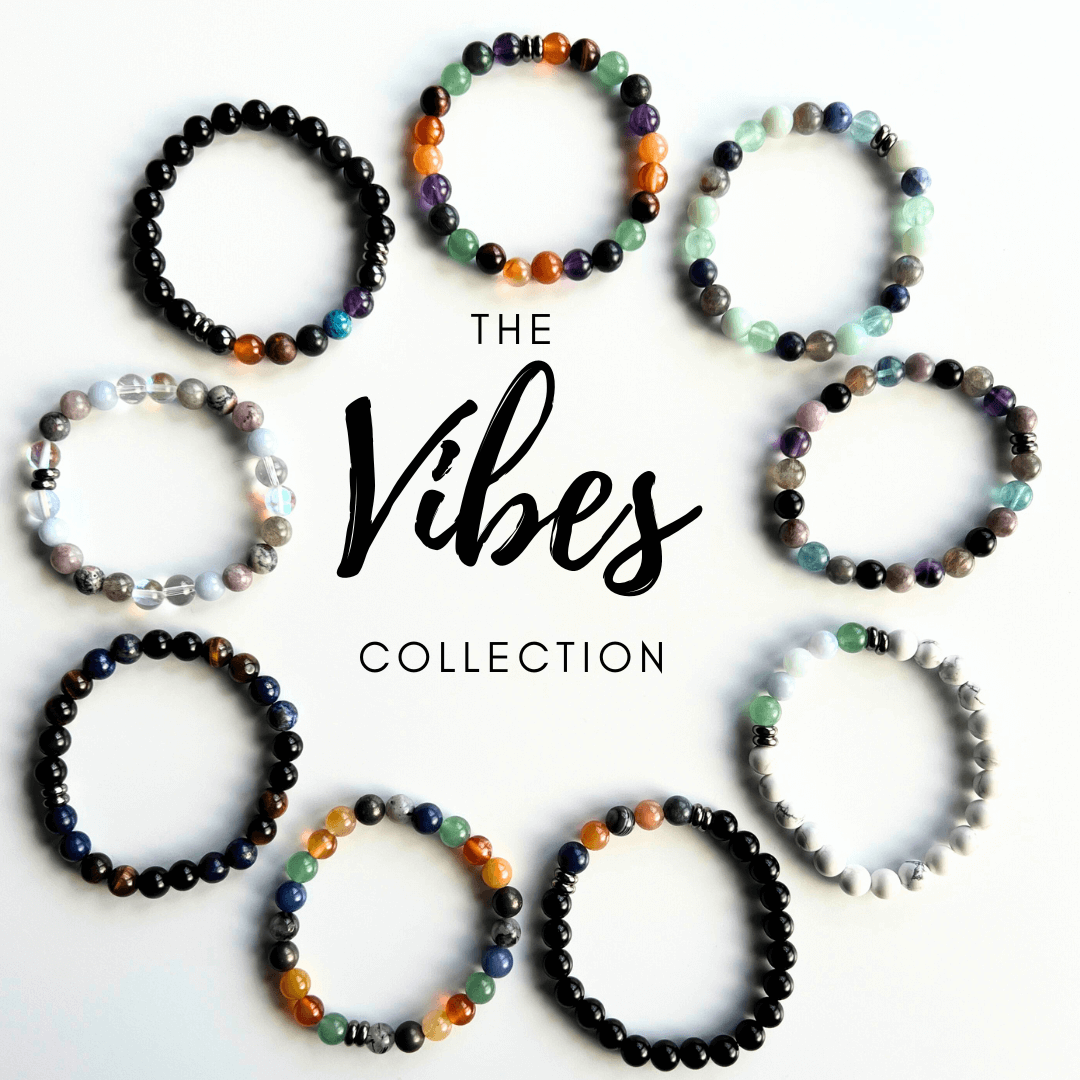 Set of beaded bracelets in black, silver, green, and orange with metal connectors