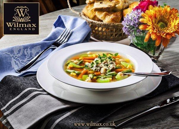 White soup plate with Wilmax England logo, round shallow bowl
