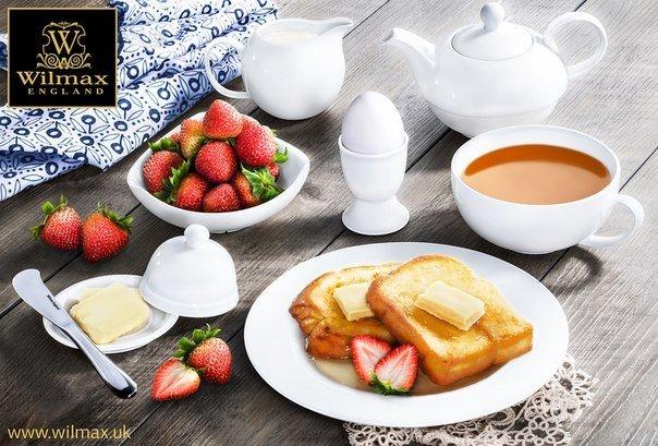 Set of 12 white 7-inch dessert plates, one plate with toast and strawberries.