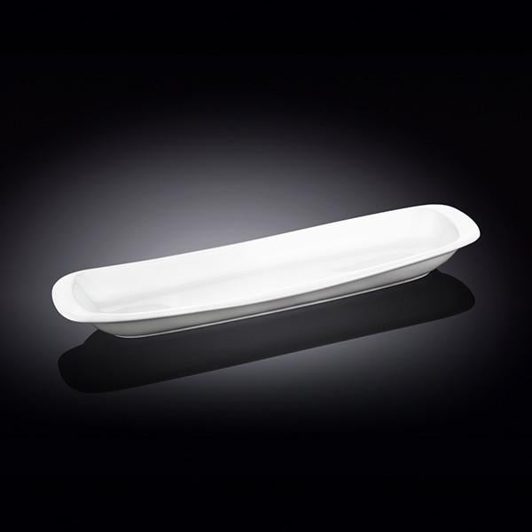 White rectangular celery tray dish with rounded corners and glossy surface