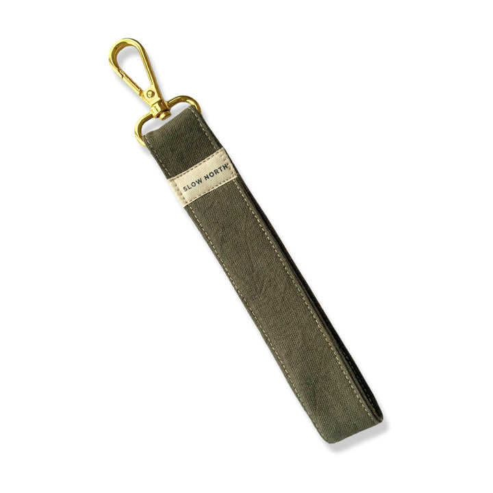 Olive fabric wristlet keychain with gold clasp and keyring