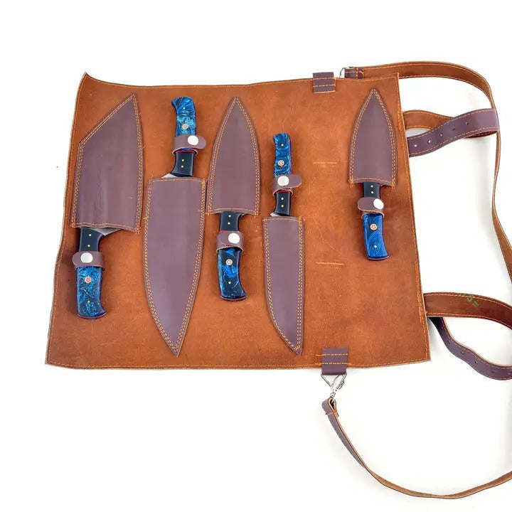Open leather knife roll with four blue-handled knives in sewn slots