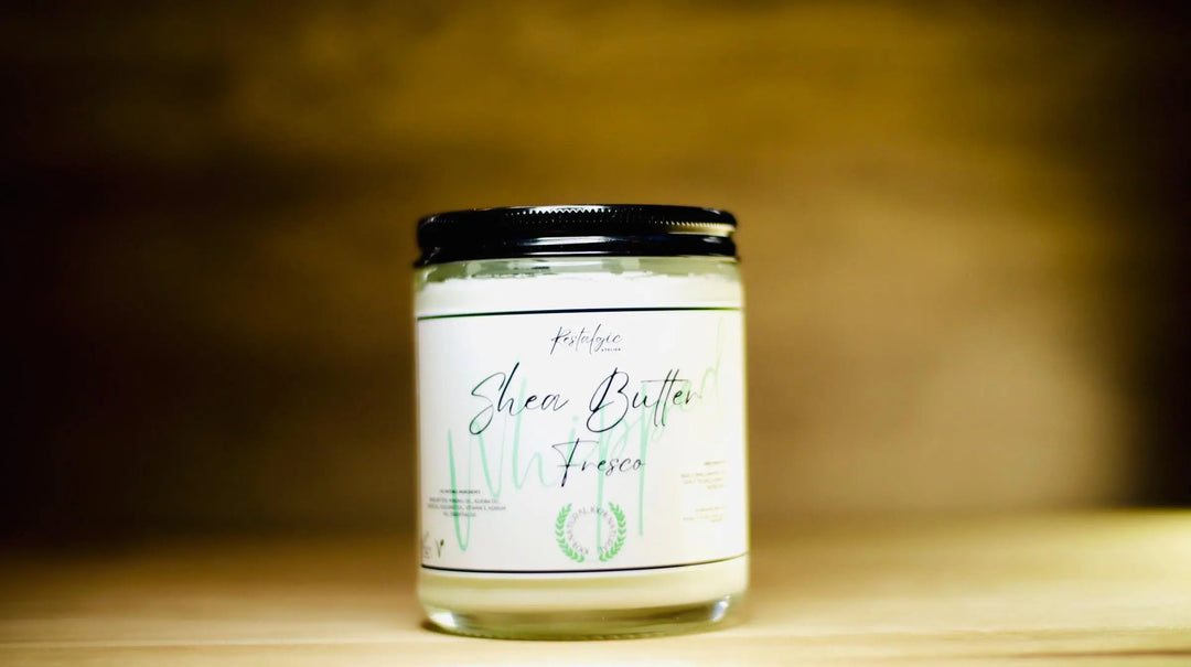 Whipped shea body butter jar with black lid and white label, centered