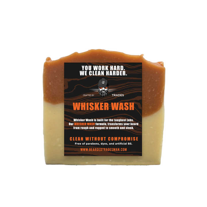 Whisker wash bar soap with cedar and amber color, rectangular label on front.