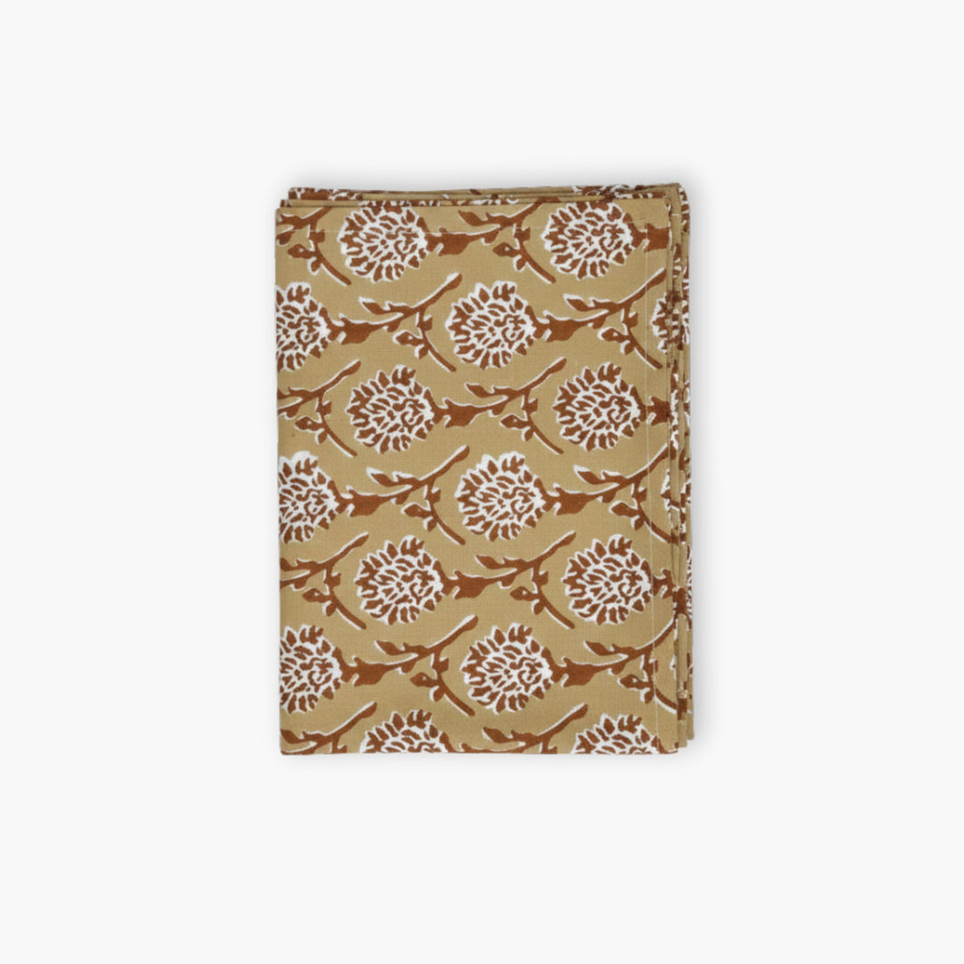 Linen runner in chai brown with hand-printed white floral medallion pattern