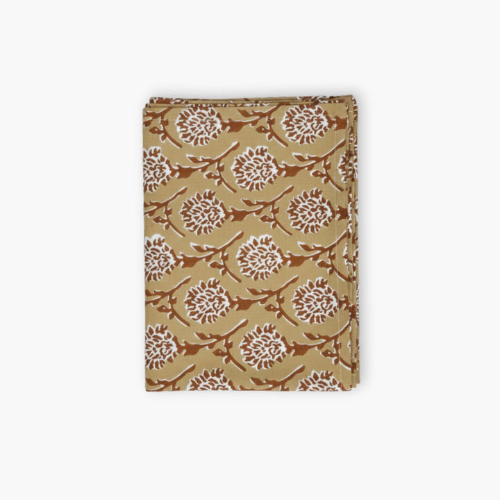 Linen runner in chai brown with hand-printed white floral medallion pattern