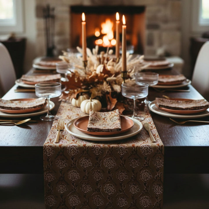 Chai brown printed linen runner with repeating white medallion motif on table