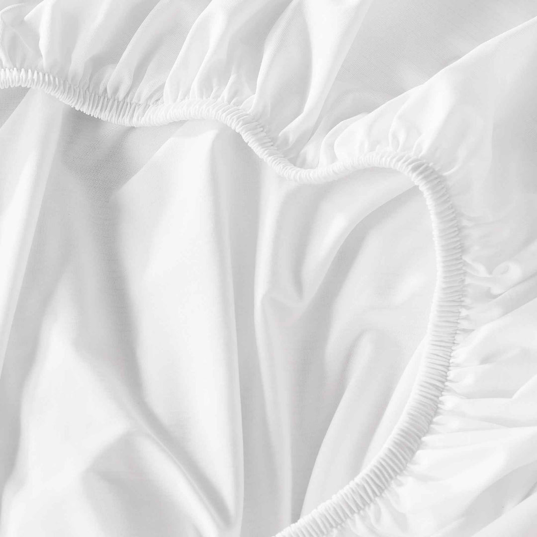 White fitted sheet elastic hem and gathering detail