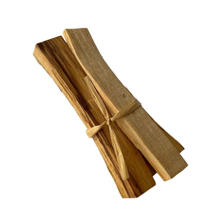 Palo Santo smudge sticks bundle, three golden-brown wood sticks tied with twine