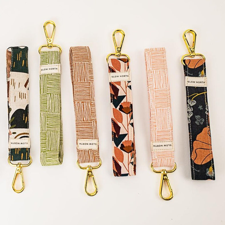 Set of five fabric wristlet keychains with gold lobster clasps