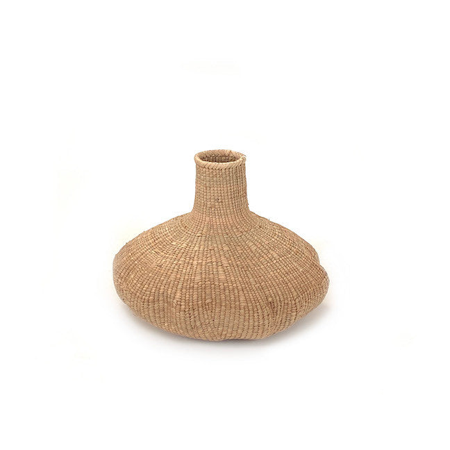 Small woven basket with rounded belly and narrow neck, tan natural fiber texture