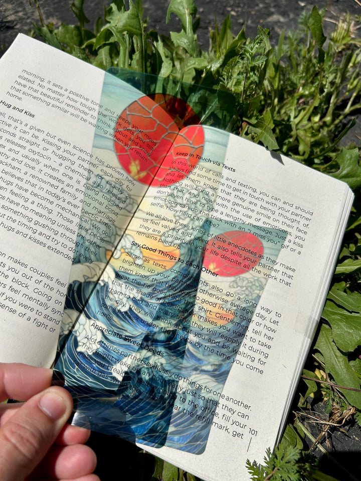 Ocean waves bookmark with blue and teal waves, red sun, and decorative Japanese-style art