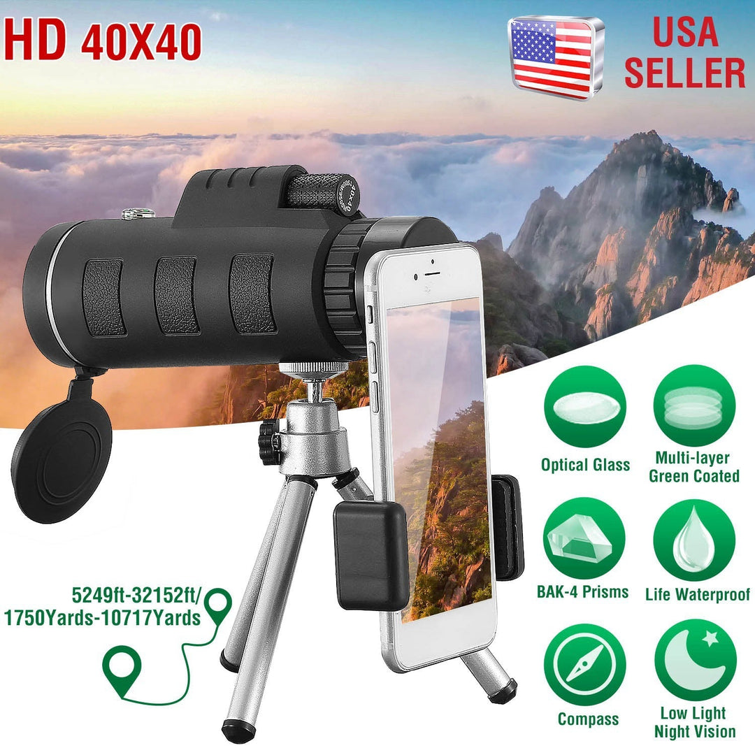 Black optical monocular telescope with tripod stand and smartphone attachment.