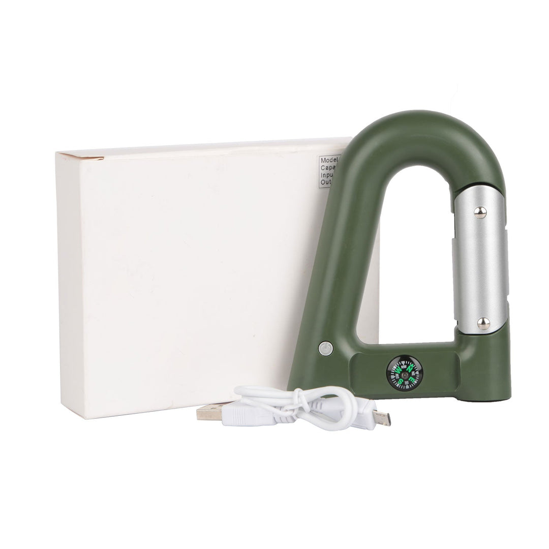 Green carabiner-shaped power bank with silver flashlight, USB cable, and retail box