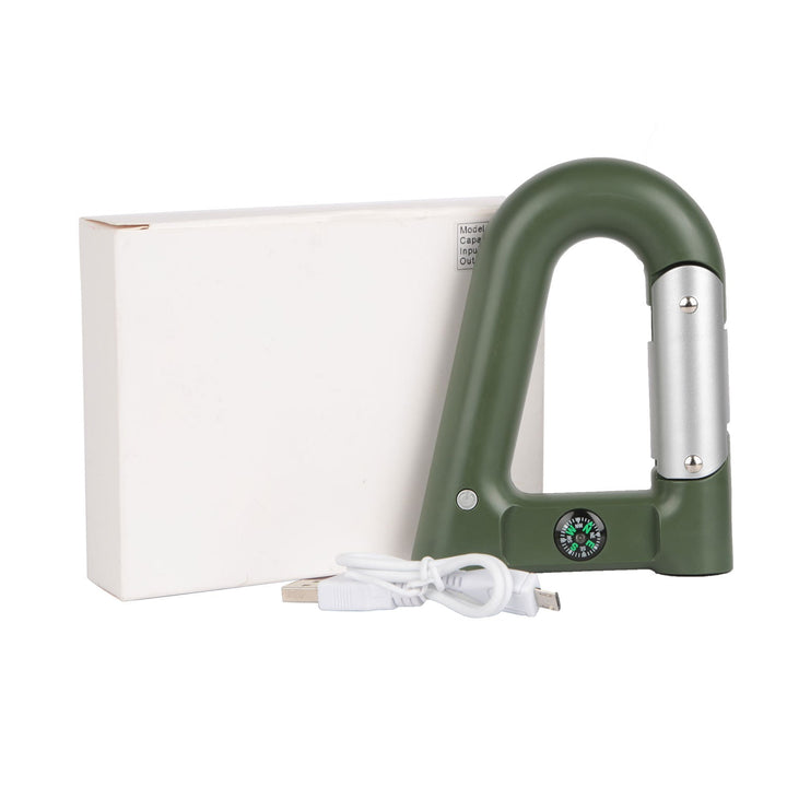 Green carabiner-shaped power bank with silver flashlight, USB cable, and retail box