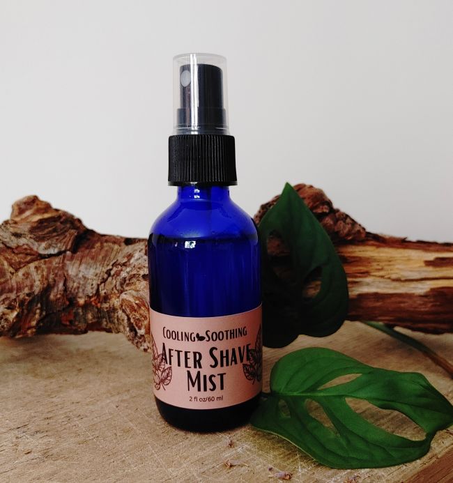Blue after shave mist spray bottle with clear pump and front label