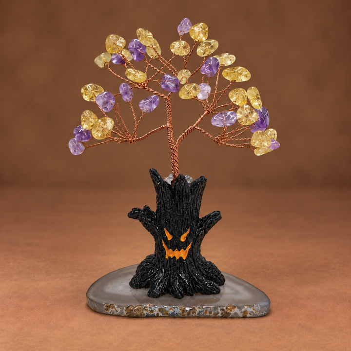 Halloween crystal tree ornament: yellow and purple faceted crystals on copper wire, black jack-o-lantern