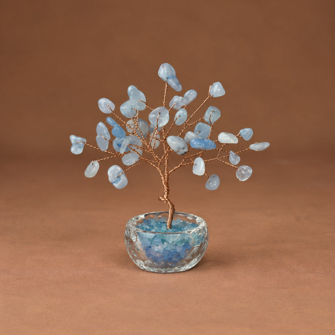 Light blue gemstone crystal tree with wire branches and round faceted crystal base