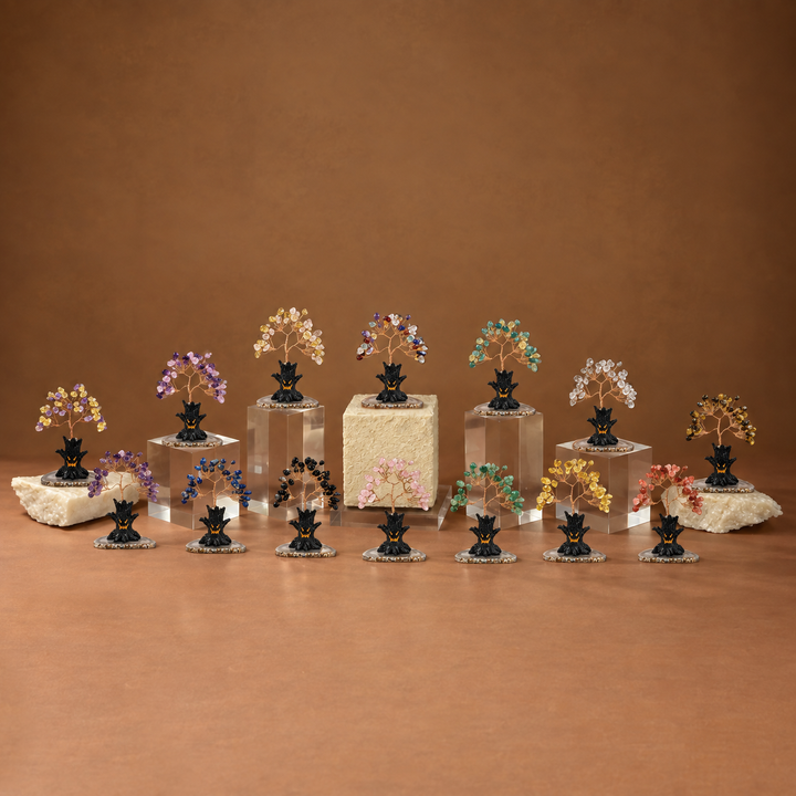Halloween crystal tree sculpture with multicolor gemstone branches on black base