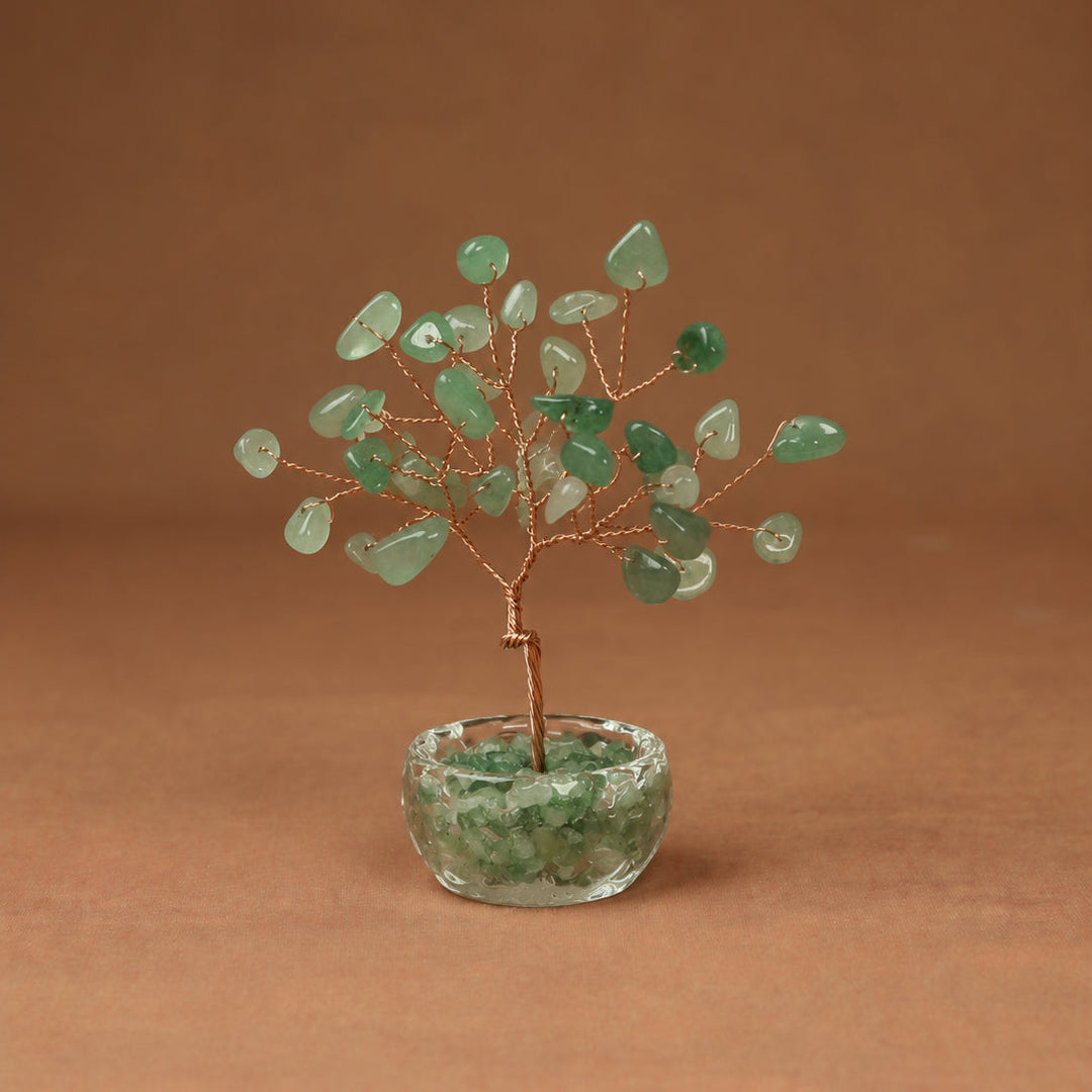 Green gemstone crystal tree with wire branches and round faceted crystal base