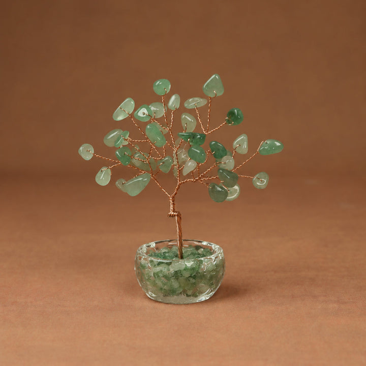Green gemstone crystal tree with wire branches and round faceted crystal base