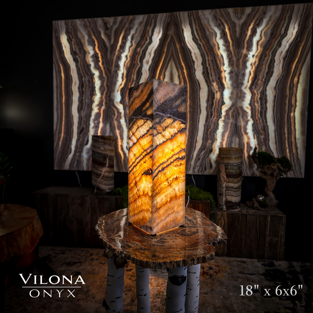 Small square table lamp with amber onyx stone shade and dark angled top panel