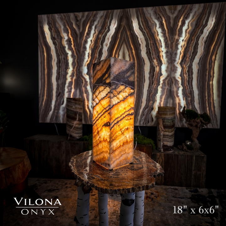 Small square table lamp with amber onyx stone shade and dark angled top panel