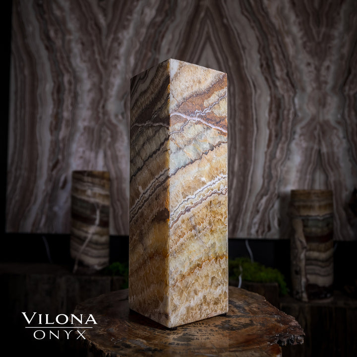 Small square table lamp with cream and tan onyx stone shade and darker corner panel