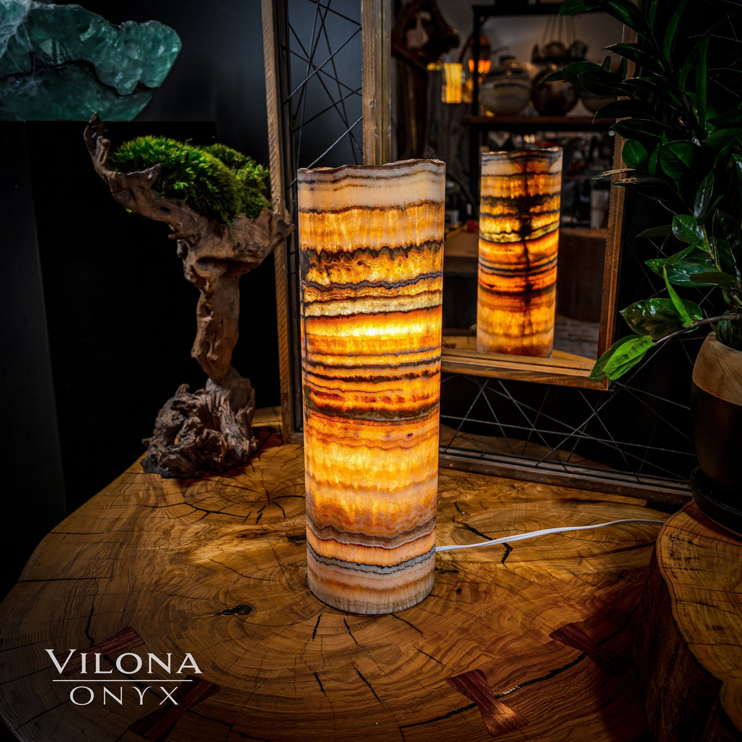 Onyx table lamp with tall cylindrical shade, bright amber stripes with dark edges