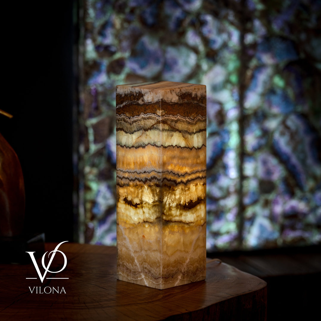 Small onyx table lamp base, square with amber, cream, and dark brown striated pattern