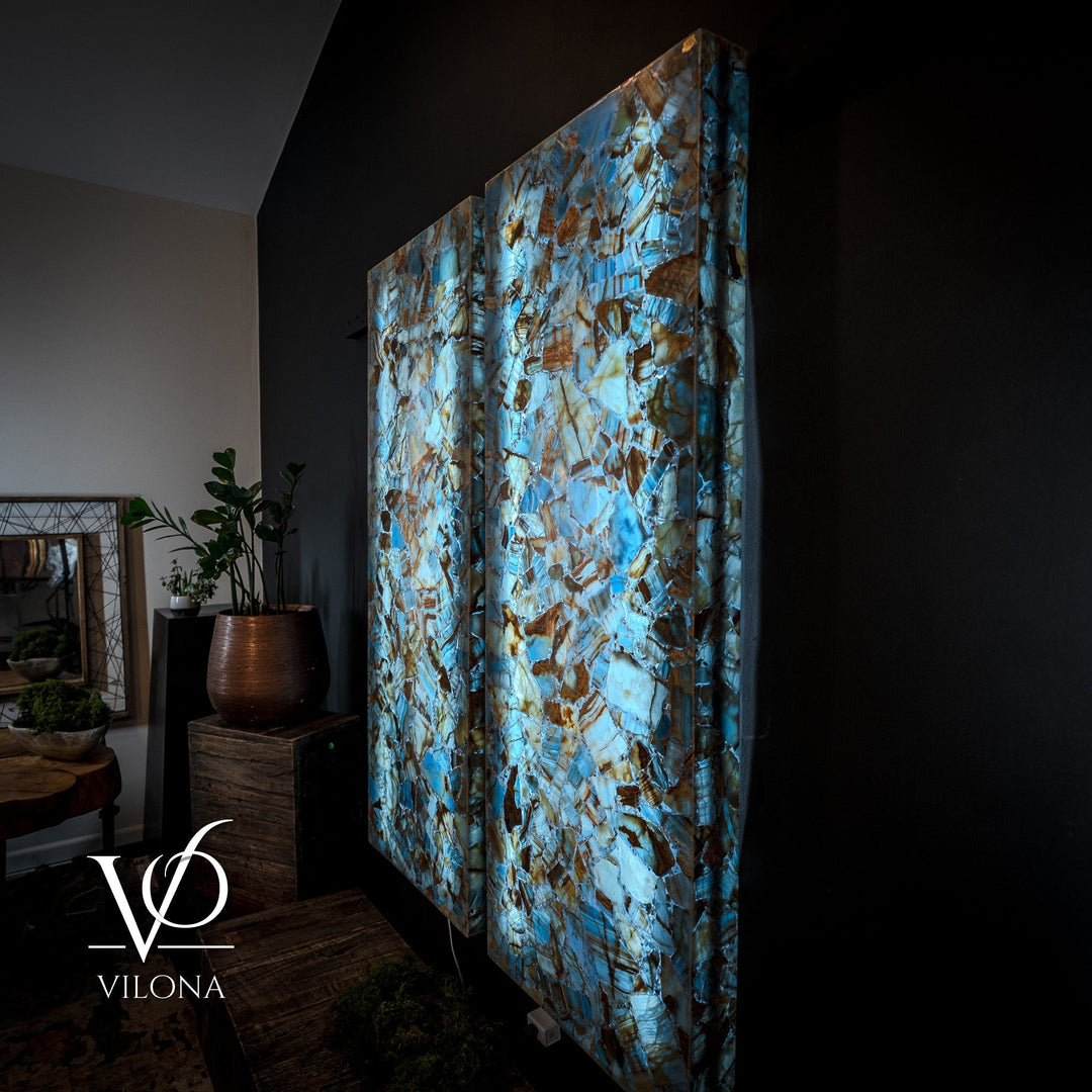 Backlit blue onyx mosaic wall panels, angled view of the two-piece set