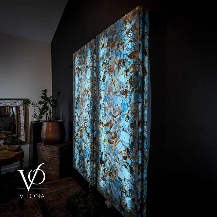 Backlit blue onyx mosaic wall panels, angled view of the two-piece set