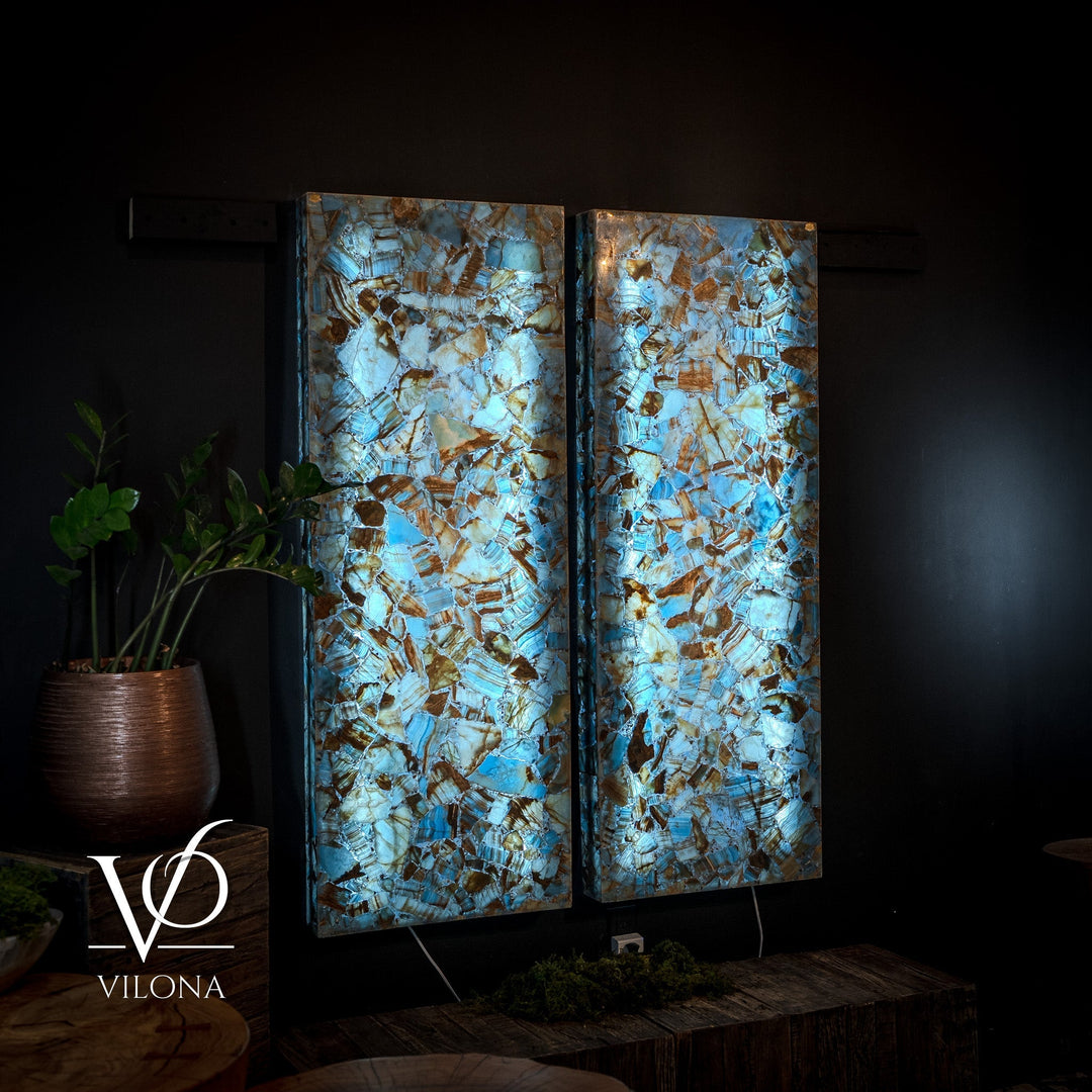 Blue onyx mosaic wall panels with backlit glow, shown as a two-panel set