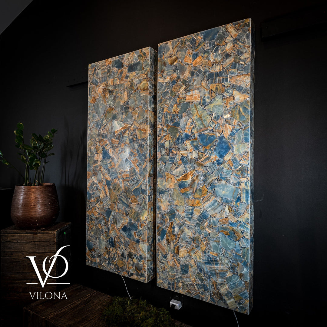 Two-piece blue onyx mosaic wall panels with backlit highlights, front-facing