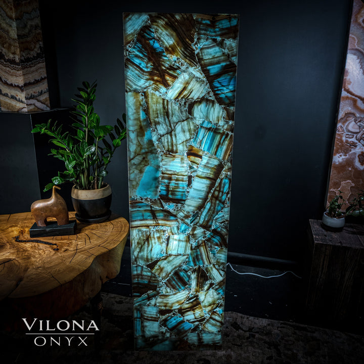 Front view of tall rectangular blue onyx floor lamp with teal, turquoise, and gold lines.