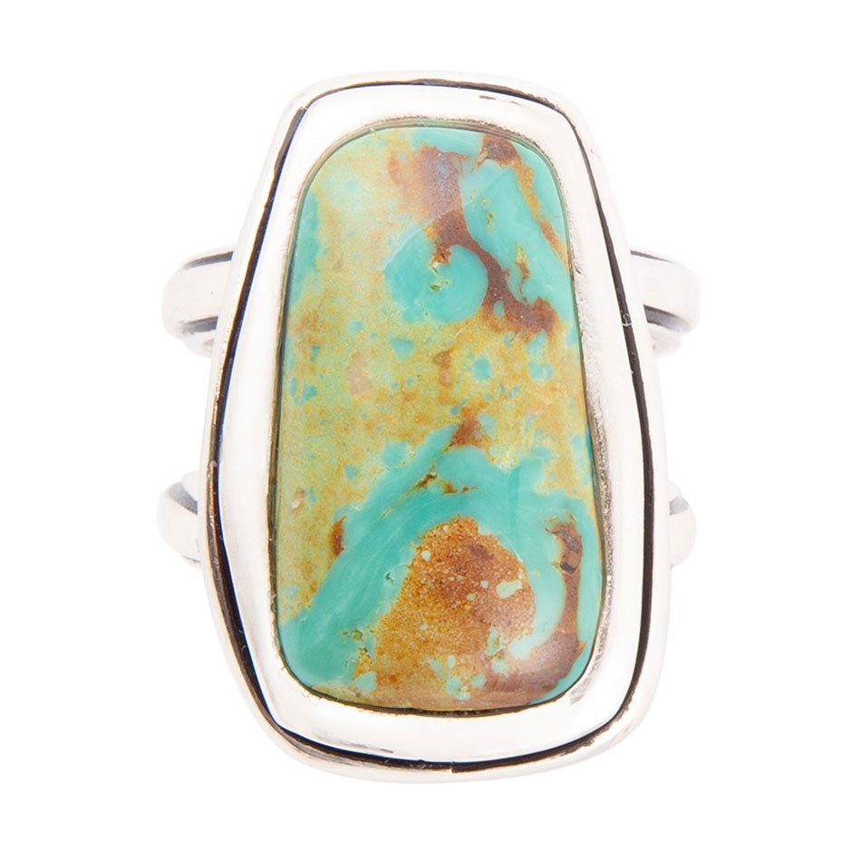 Sterling silver statement ring with oval-rectangular turquoise cabochon
