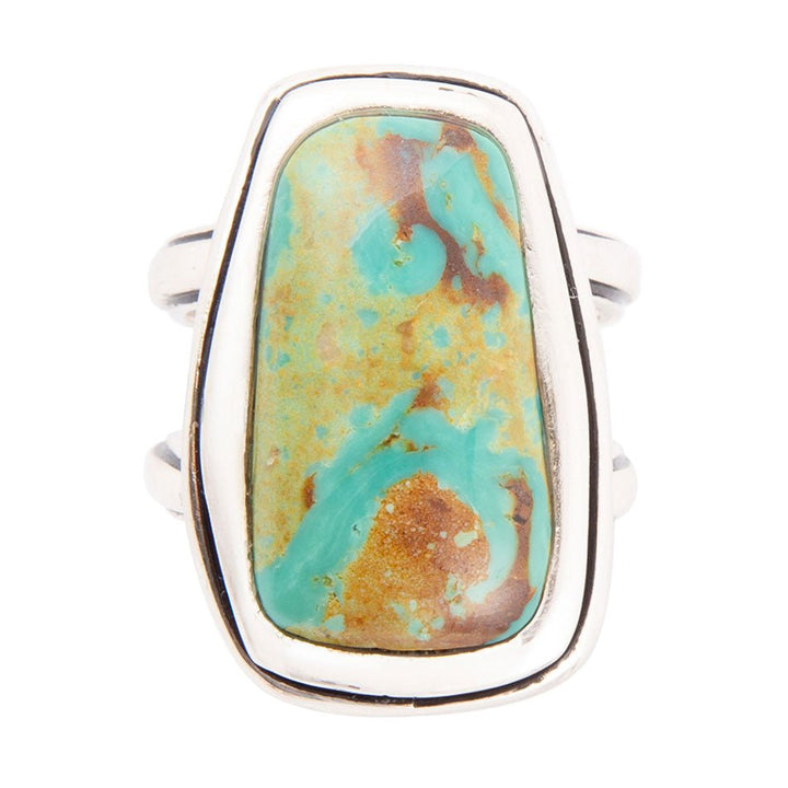 Sterling silver statement ring with oval-rectangular turquoise cabochon