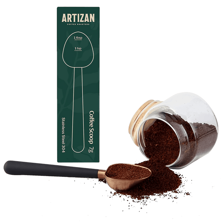 Rose gold coffee measuring scoop with coffee grounds and retail box, 1 tbsp/1 tsp markings