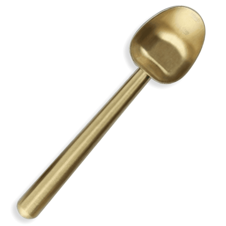 Gold coffee measuring scoop with stamped 1 tbsp/1 tsp markings