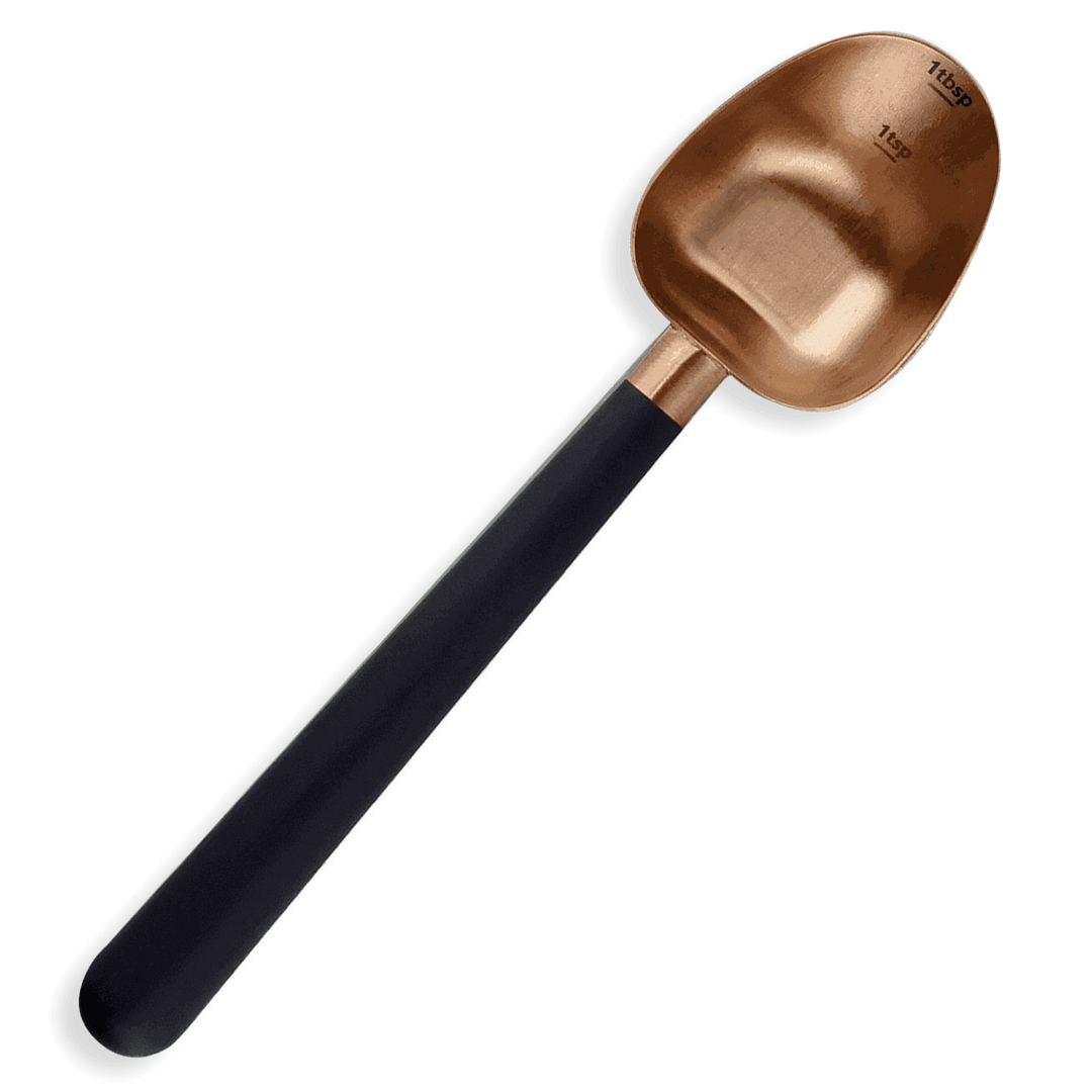 Rose gold coffee measuring scoop with black handle and stamped 1 tbsp/1 tsp