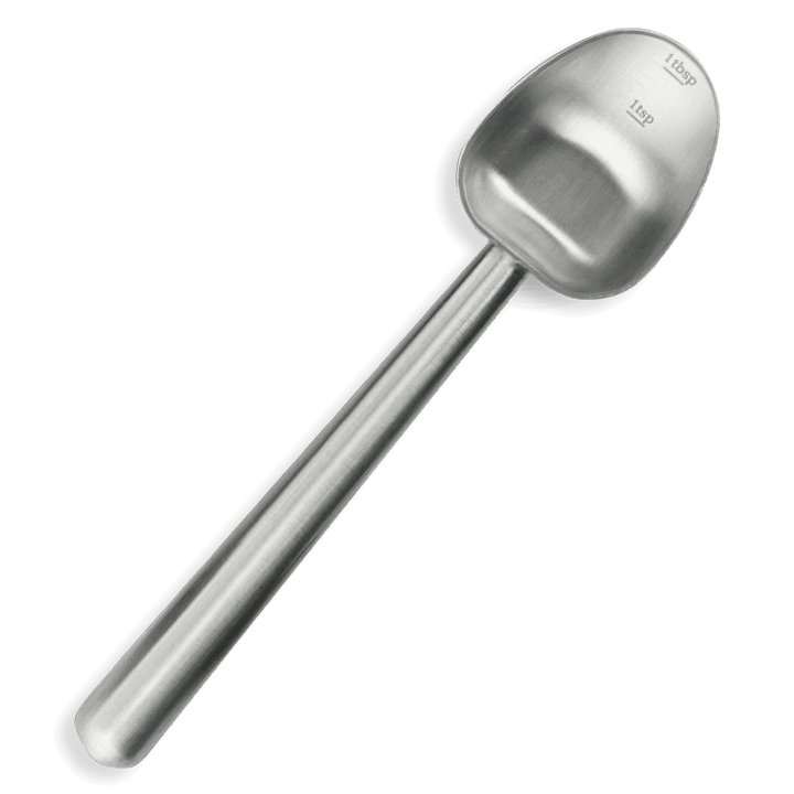 Silver coffee measuring scoop with stamped 1 tbsp/1 tsp markings and black rim