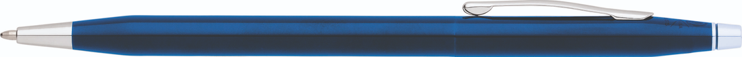 Glossy translucent blue ballpoint pen end with silver tip, narrow crop