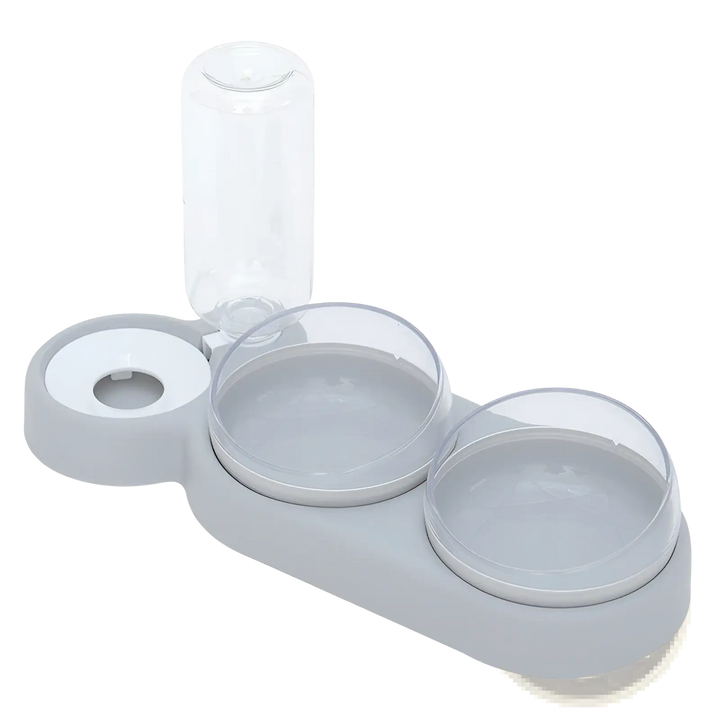 Automatic pet feeder and water fountain with double bowls, white base and clear reservoir